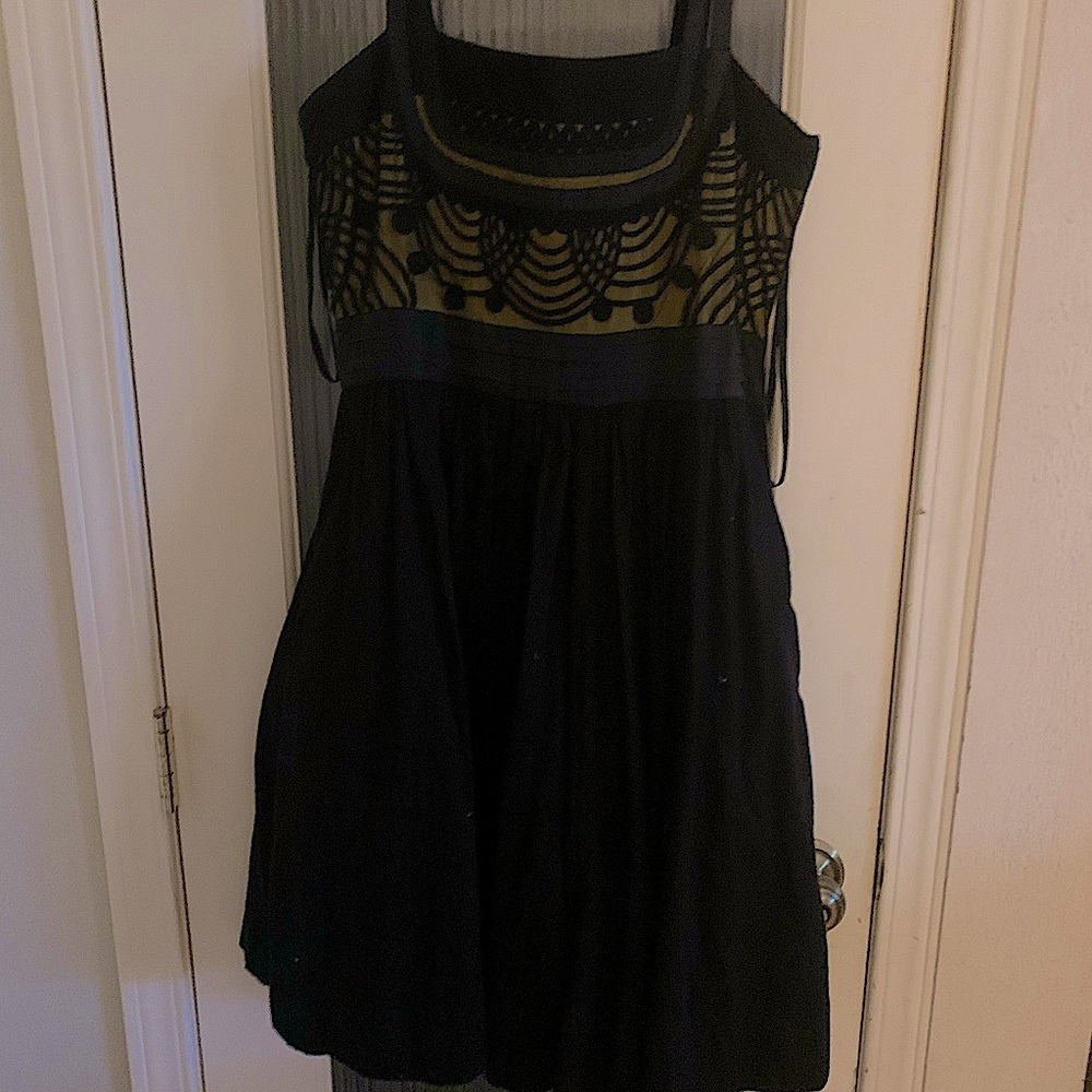 Summer dress, all black with a bit of yellow. Top has a 1920’s vibe to it.